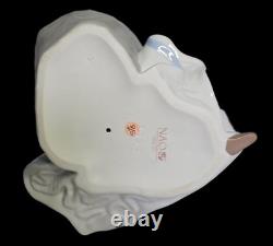 12 NAO-Lladro Spring Reflections, lady with flower, #1392G, Spain, 2000