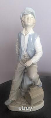 1970s Nao (Lladro) Porcelain figure of a Shoeshine Boy