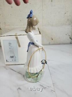 1989 NAO by Lladro Porcelain Figurine Nina con aro y perrito No. 379 dog