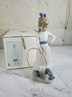 1989 NAO by Lladro Porcelain Figurine Nina con aro y perrito No. 379 dog