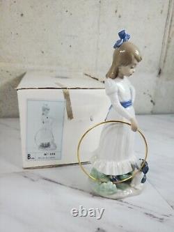 1989 NAO by Lladro Porcelain Figurine Nina con aro y perrito No. 379 dog