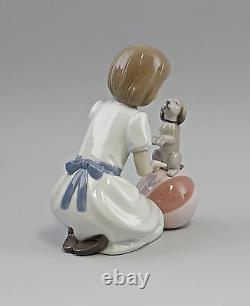 9956122 New Trick Girl with Puppy on Ball Nao Lladro Spain 17x20cm