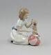 9956122 a New Trick Girl with Puppy on Ball Nao Lladro Spain 17x20cm