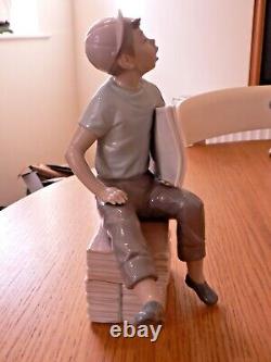 A Stunning Lladro / Nao Newspaper Boy Figure