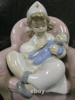 Beautiful Lladro / NAO Playing Nurse Figurine Nice Piece