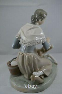 Delightful Lladro Figure Caressing A Little Calf Ref. No. 4827