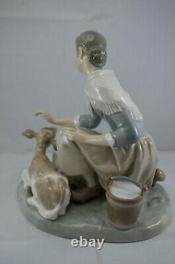 Delightful Lladro Figure Caressing A Little Calf Ref. No. 4827