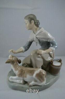 Delightful Lladro Figure Caressing A Little Calf Ref. No. 4827