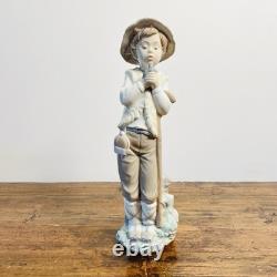 Great porcelain figurine Nao Lladró-boy with bird-28 cm Great porcelain figurine Nao Lladró-boy with bird-28 cm