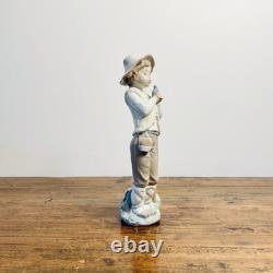 Great porcelain figurine Nao Lladró-boy with bird-28 cm Great porcelain figurine Nao Lladró-boy with bird-28 cm