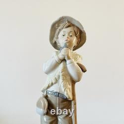 Great porcelain figurine Nao Lladró-boy with bird-28 cm Great porcelain figurine Nao Lladró-boy with bird-28 cm