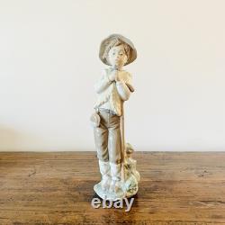 Great porcelain figurine Nao Lladró-boy with bird-28 cm Great porcelain figurine Nao Lladró-boy with bird-28 cm