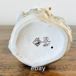 Great porcelain figurine Nao Lladró-boy with bird-28 cm Great porcelain figurine Nao Lladró-boy with bird-28 cm