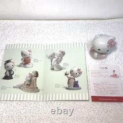 Hello kitty lladro nao sanrio porcelain figure dresses pink collection ribbon