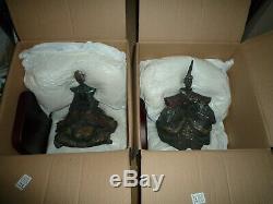 LLADRO'EMPEROR & EMPRESS' and Wood stands. 12300 &12301. 1995 to 1999