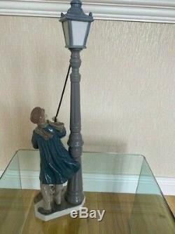 LLADRO Lamplighter Figurine. Porcelain