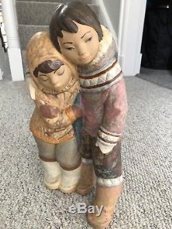 Large Lladro figure eskimo boy and girl couple from the arctic great condition