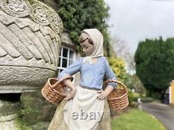 Large Nao/Lladro Gres figure of a lady carrying baskets, H38cm