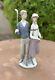 Lladro 1453 Golfing Couple Porcelain Figurine