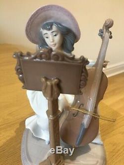 Lladro CONCERTO #6332 LADY PLAYING THE CELLO WITH MUSIC SHEET, VERY RARE, MINT