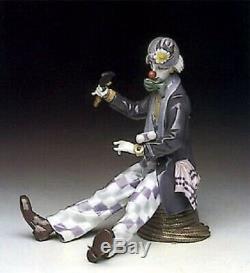 Lladro Checking The Time. 5762. Large clown. New in box