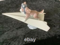 Lladro Dog on a paper plane