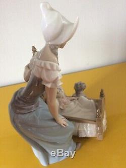 Lladro Dutch Lady With Baby In Cot