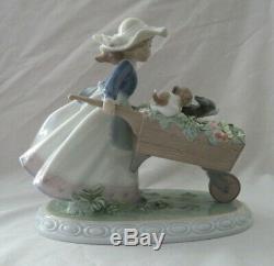 Lladro Figurine #5460 A Barrow of Fun Girl Pushing Wheelbarrow