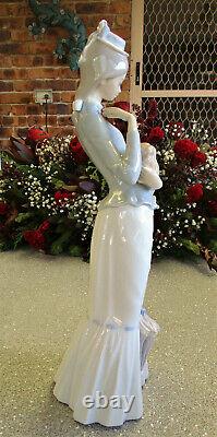 Lladro Figurine Lady walking the Pekinese 37cm or 14.5 inches High
