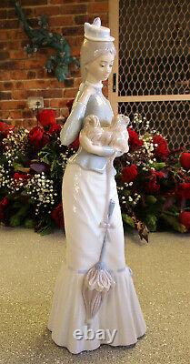 Lladro Figurine Lady walking the Pekinese 37cm or 14.5 inches High