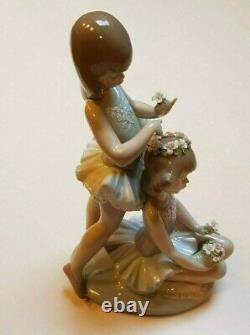 Lladro'First Ballet' No 5714. Girl ballerinas with flowers