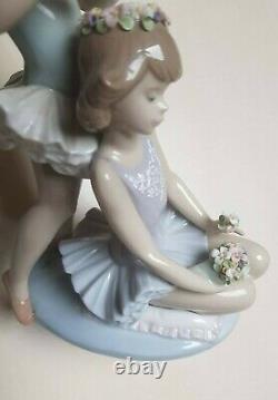 Lladro'First Ballet' No 5714. Girl ballerinas with flowers