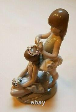 Lladro'First Ballet' No 5714. Girl ballerinas with flowers