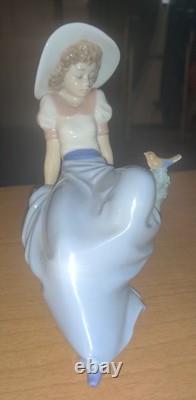 Lladro Girl Sitting With Bird 1987 by Nao Vintage Porcelain made in Spain