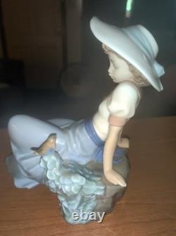 Lladro Girl Sitting With Bird 1987 by Nao Vintage Porcelain made in Spain