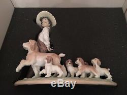 Lladro My Little Explorers. 6828. Boy with puppies. Privilege. Mint In Box