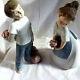 Lladro NAO Dolls Set of 2 Young man with bouquet, girl with bouquet, girl
