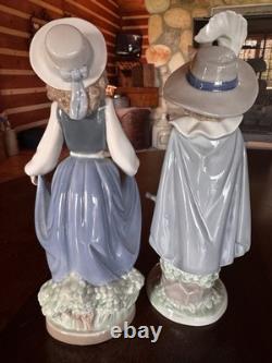Lladró NAO Figurines Set 01005 Girl with Flowers & 01043 Musketeer Boy with Boxes
