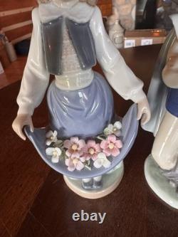 Lladró NAO Figurines Set 01005 Girl with Flowers & 01043 Musketeer Boy with Boxes