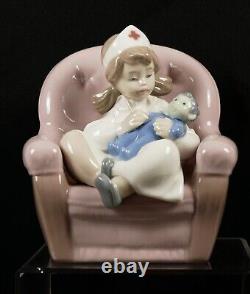 Lladro Nao Figure Playing Nurse Girl in Nurses Uniform with Doll 02001055