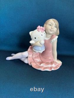 Lladro Nao Hello Kitty Ceramic Figure Pink, 8 tall, used, no box