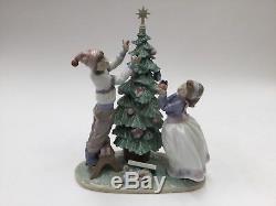 Lladro Trimming The Tree. 5897. 12.5'' tall