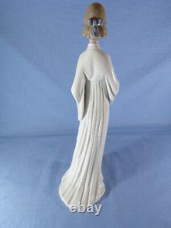 Lladro figure called unity model no 6377 sculptured by Marco Antonio Nogueron