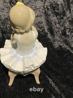 Lladro''first Performance'' Seated Ballerina With Bouquet Of Flowers