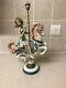 Lladro girl on carousel horse, with box