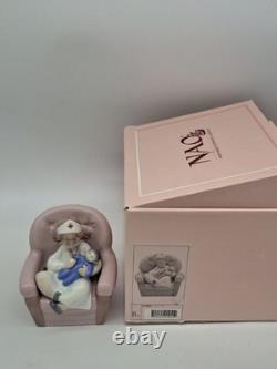 NAO BY LLADRO GIRL PLAYING NURSE/ #1055 On CHAIR HOLDING DOLL, Box, No Insert