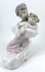 NAO By Lladro Figurine 1467 A Hug of Love 2003 Handmade in Spain Retired