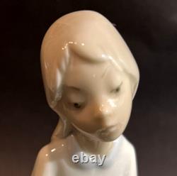 NAO / Lladro Figure Girl with Candle Glossy Finish about 8-1/4 tall