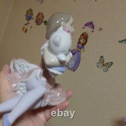NAO Lladro × SANRIO Colaboration Playing with Hello Kitty Porcelain Figurine