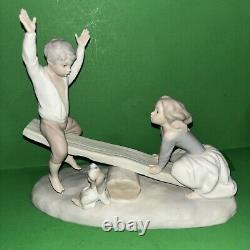 NAO Lladro Spain Bisque Porcelain Boy and Girl on Seesaw with Dog